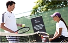 Henman gives top tips to junior wheelchair tennis player
